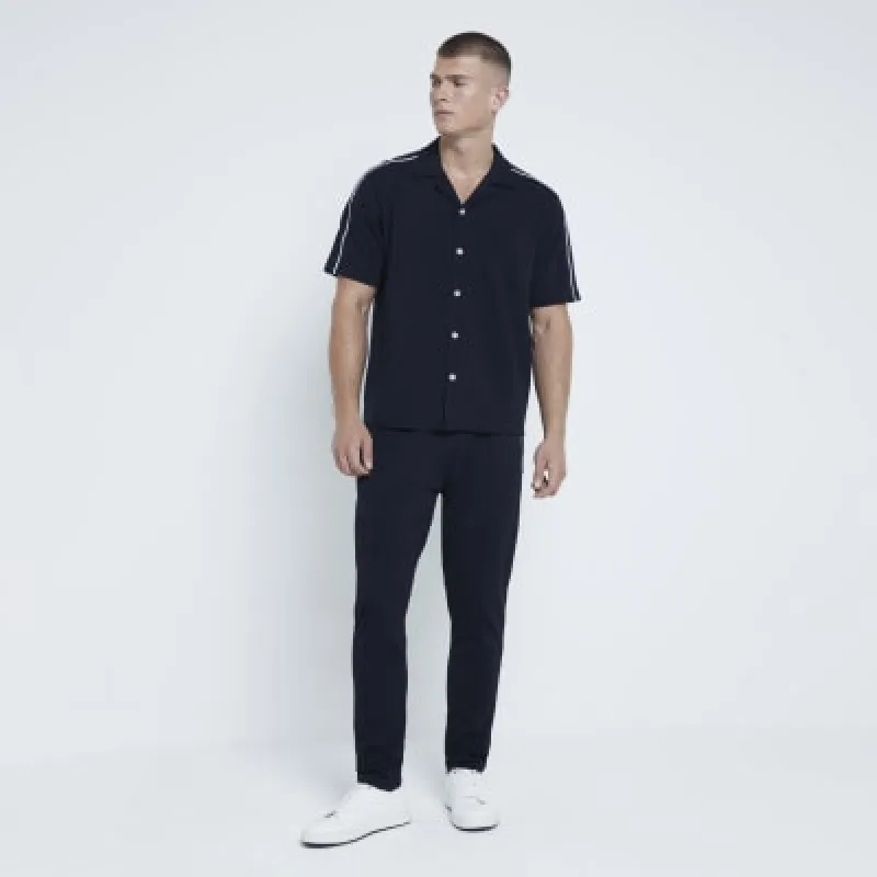 Navy Twill Polo shirt sold by River Island