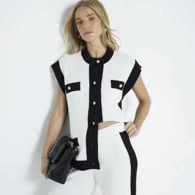 Cream short sleeve panelled waistcoat sold by River Island