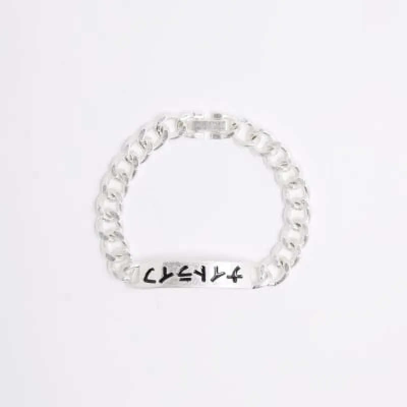 Silver Metal Japanese Writing Bracelet sold by River Island