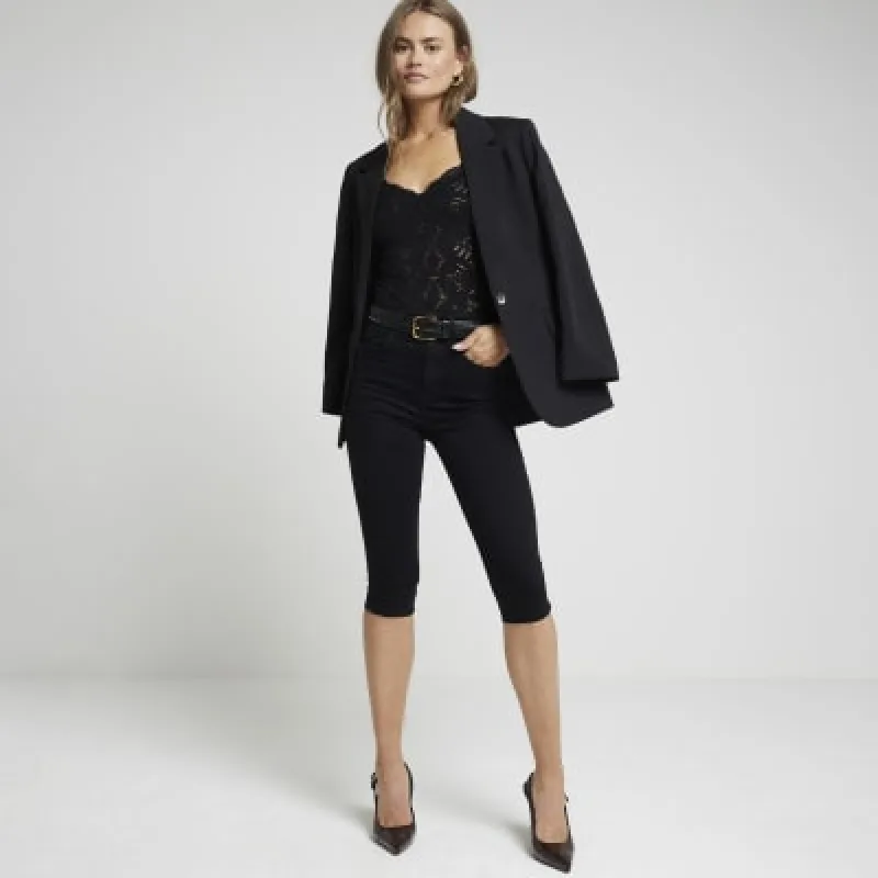 Black lace seamless bodysuit sold by River Island