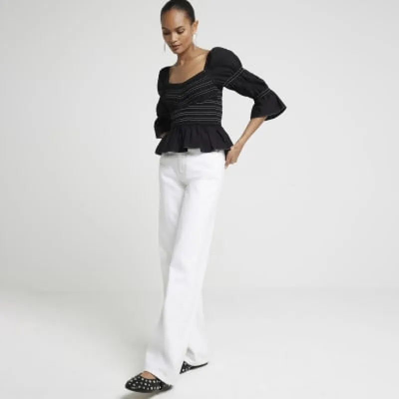 Black shirred stitched blouse sold by River Island