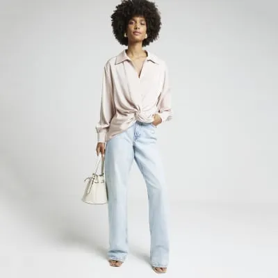 Pink satin front knot blouse sold by River Island