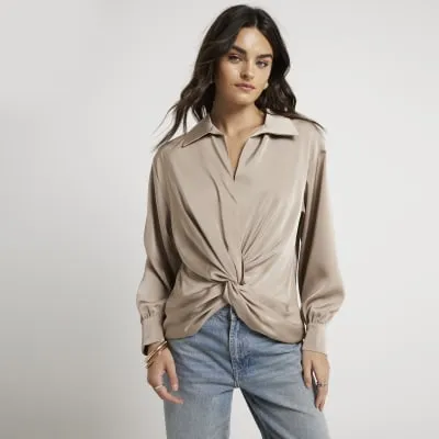 Beige satin front knot blouse sold by River Island