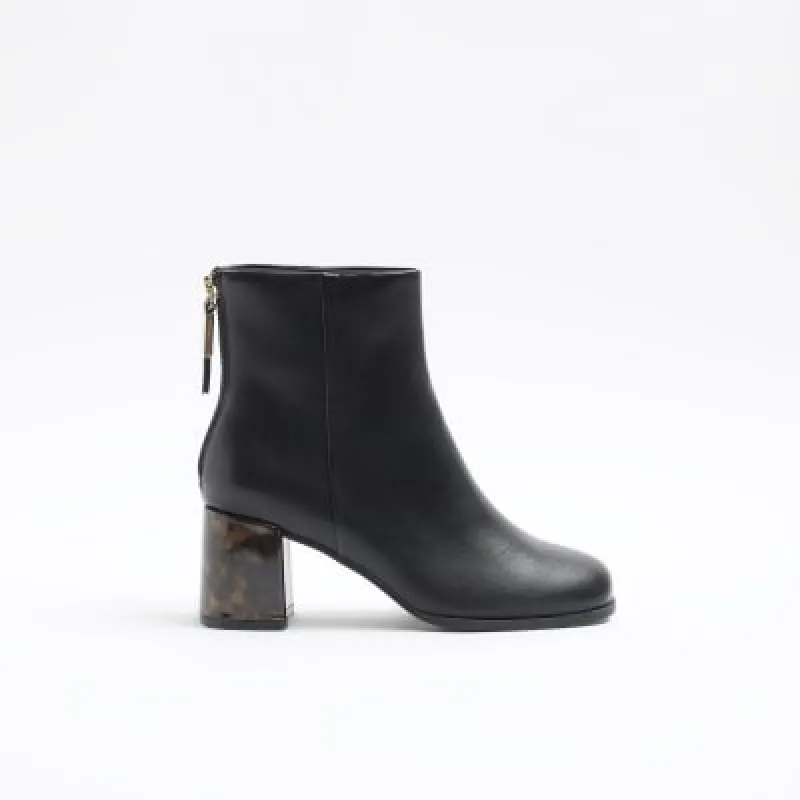 Black tortoiseshell block heeled ankle boots sold by River Island