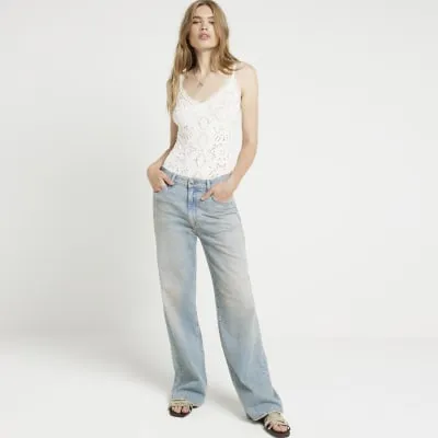 Cream lace seamless bodysuit sold by River Island