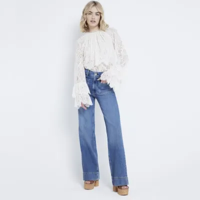 Blue High waisted wide leg jeans sold by River Island