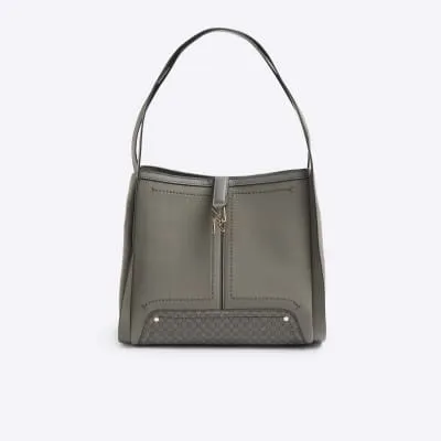 Grey suedette embossed RI monogram tote bag sold by River Island