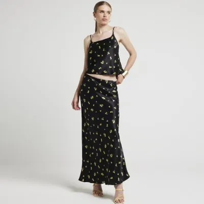 Black satin floral maxi skirt sold by River Island