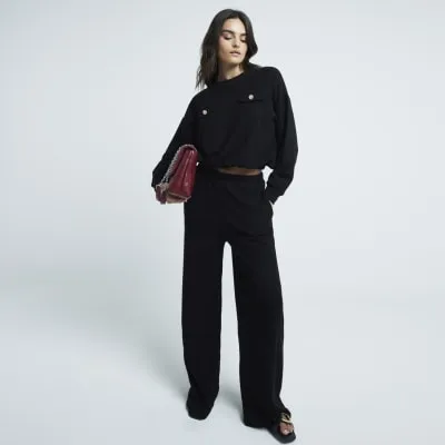 Black Boucle Elasticated Hem Sweatshirt sold by River Island