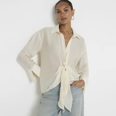 Cream twist front button up shirt sold by River Island