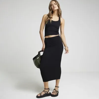 Black Textured Seamless Midi Skirt sold by River Island
