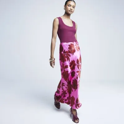 Pink satin floral maxi skirt sold by River Island