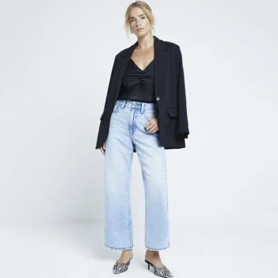 Black ruched front cami top sold by River Island