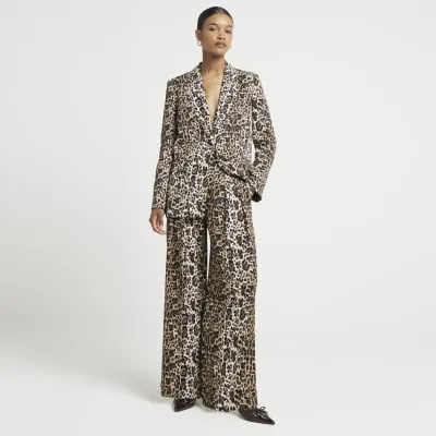 Brown leopard print wide leg trousers sold by River Island