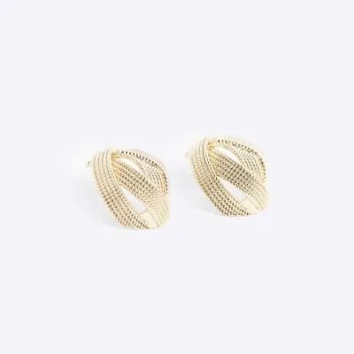 Gold textured cross over earrings sold by River Island
