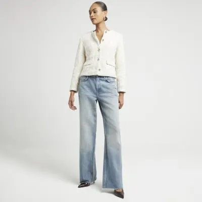 Cream sequin boucle jacket sold by River Island