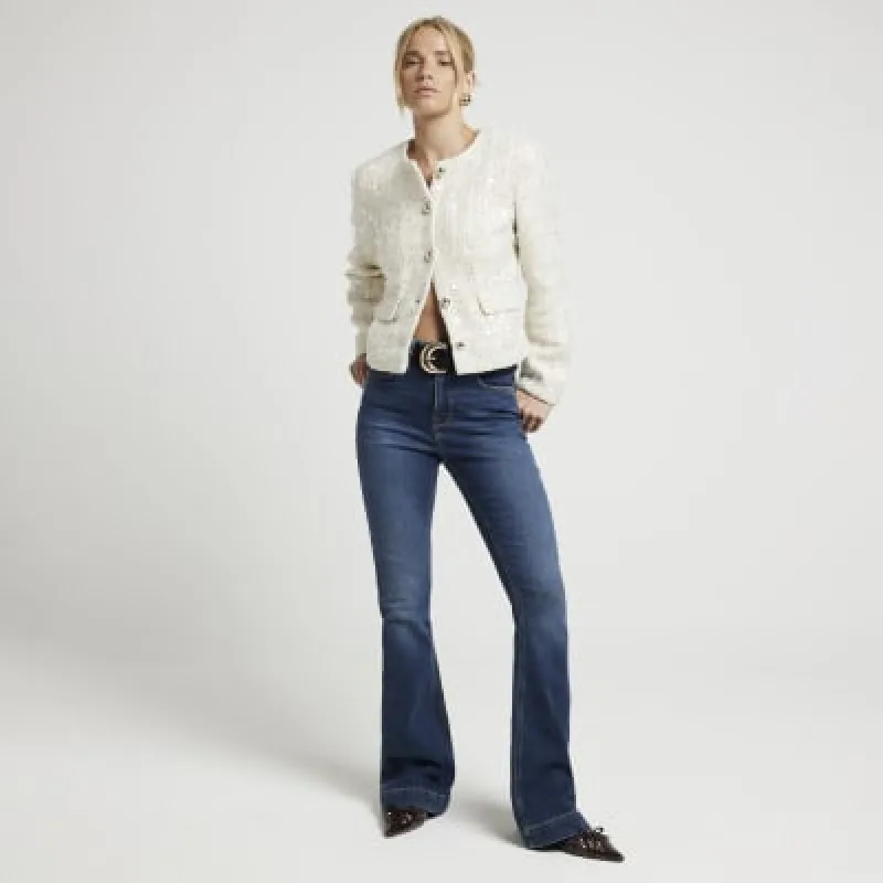 Blue bootcut fit flare jeans sold by River Island