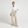 Beige double waist wide leg trousers sold by River Island
