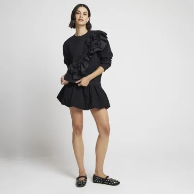 Black flower frill sweatshirt sold by River Island