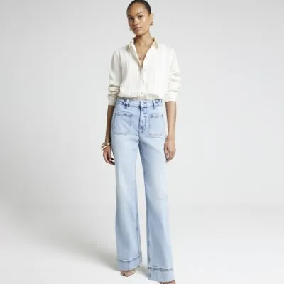 Blue high waisted wide leg jeans sold by River Island