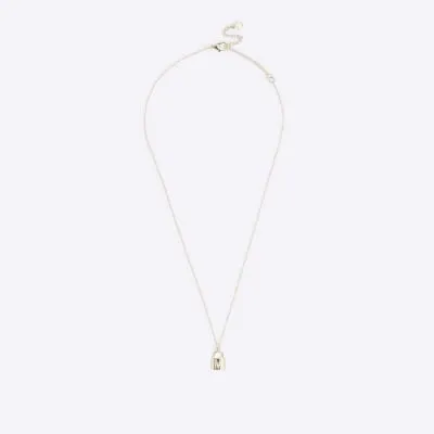 Gold M initial lock necklace sold by River Island