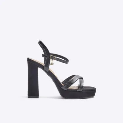 Black crossed strap heeled sandals sold by River Island