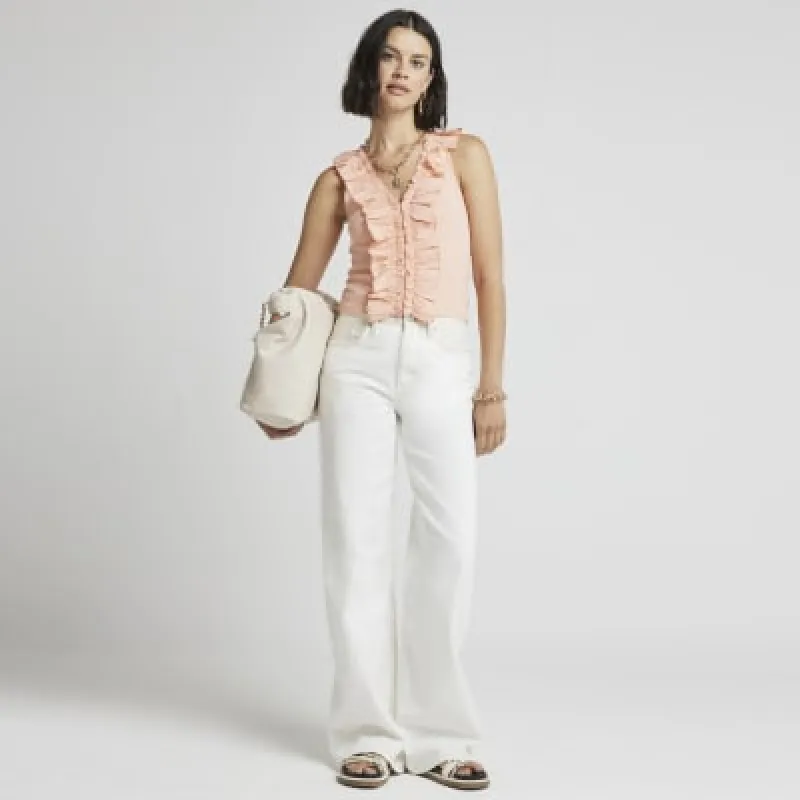 Pink ruffle detail ribbed tank top sold by River Island