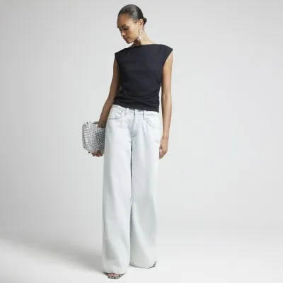 Black ribbed ruched side vest top sold by River Island