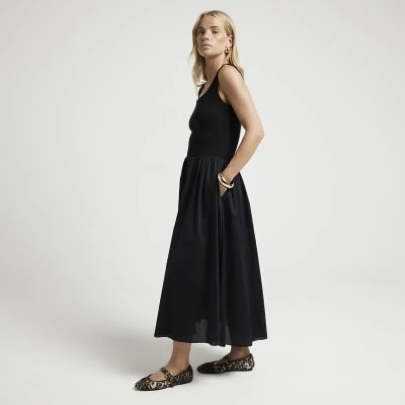 Black hybrid skater midi dress sold by River Island