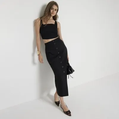 Black linen blend button up maxi skirt sold by River Island