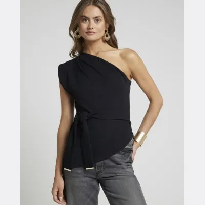 Black belted asymmetric vest top sold by River Island