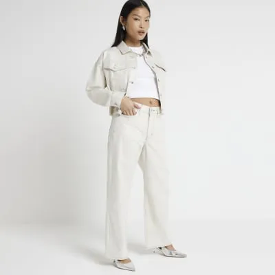 Petite Cream relaxed straight fit jeans sold by River Island