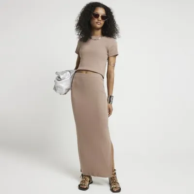 Beige ribbed maxi skirt sold by River Island
