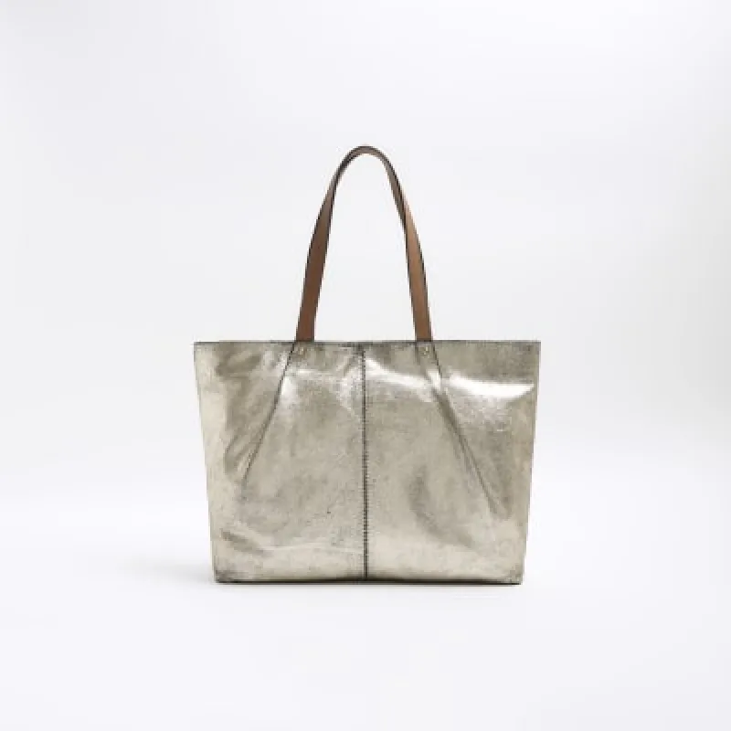 Gold Metallic Leather Shopper Bag sold by River Island