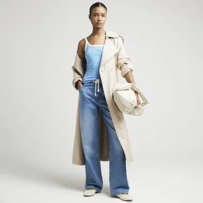 Blue tipped cami vest top sold by River Island