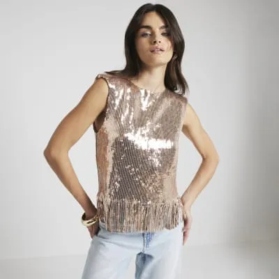 Rose gold sequin fringe vest top sold by River Island