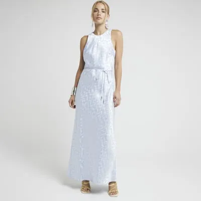 Blue jacquard belted slip maxi dress sold by River Island