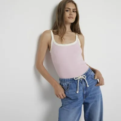 Pink tipped cami vest top sold by River Island