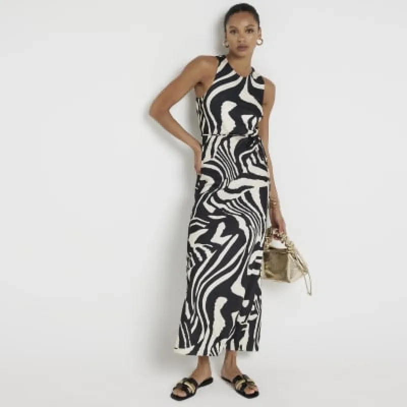 Black zebra print belted slip maxi dress sold by River Island