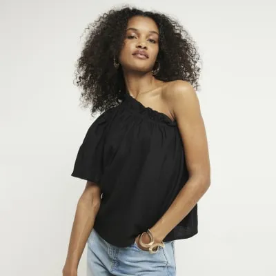 Black linen blend one shoulder top sold by River Island