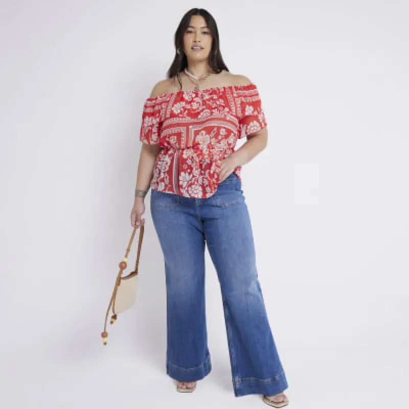 Plus blue high waisted flared jeans made by River Island