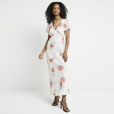 White floral flute sleeve swing midi dress sold by River Island