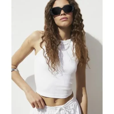White ribbed crop tank top sold by River Island