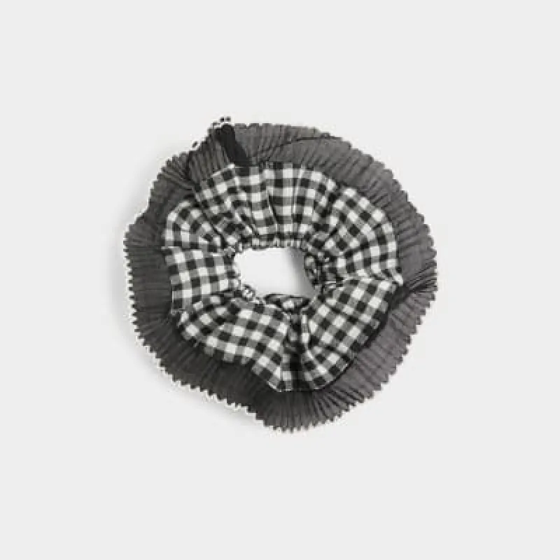 Black gingham print hair scrunchie sold by River Island