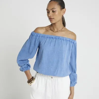 Blue textured bardot top sold by River Island