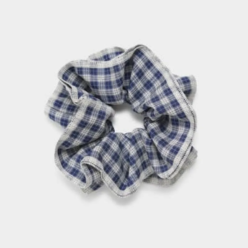 Navy check hair scrunchie sold by River Island