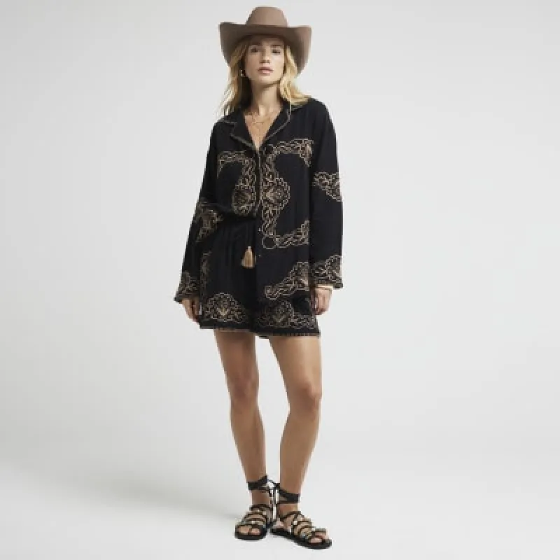 Black embroidered shirt sold by River Island