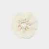 White ruffle hair scrunchie sold by River Island