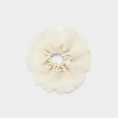 White ruffle hair scrunchie sold by River Island