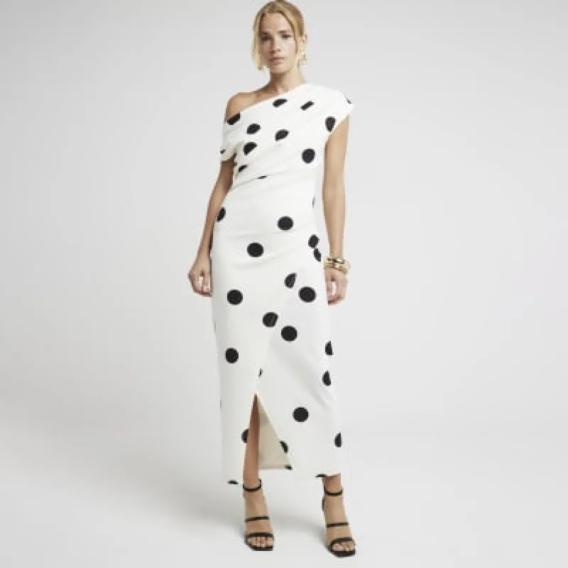 Cream spot drape bodycon midi dress made by River Island